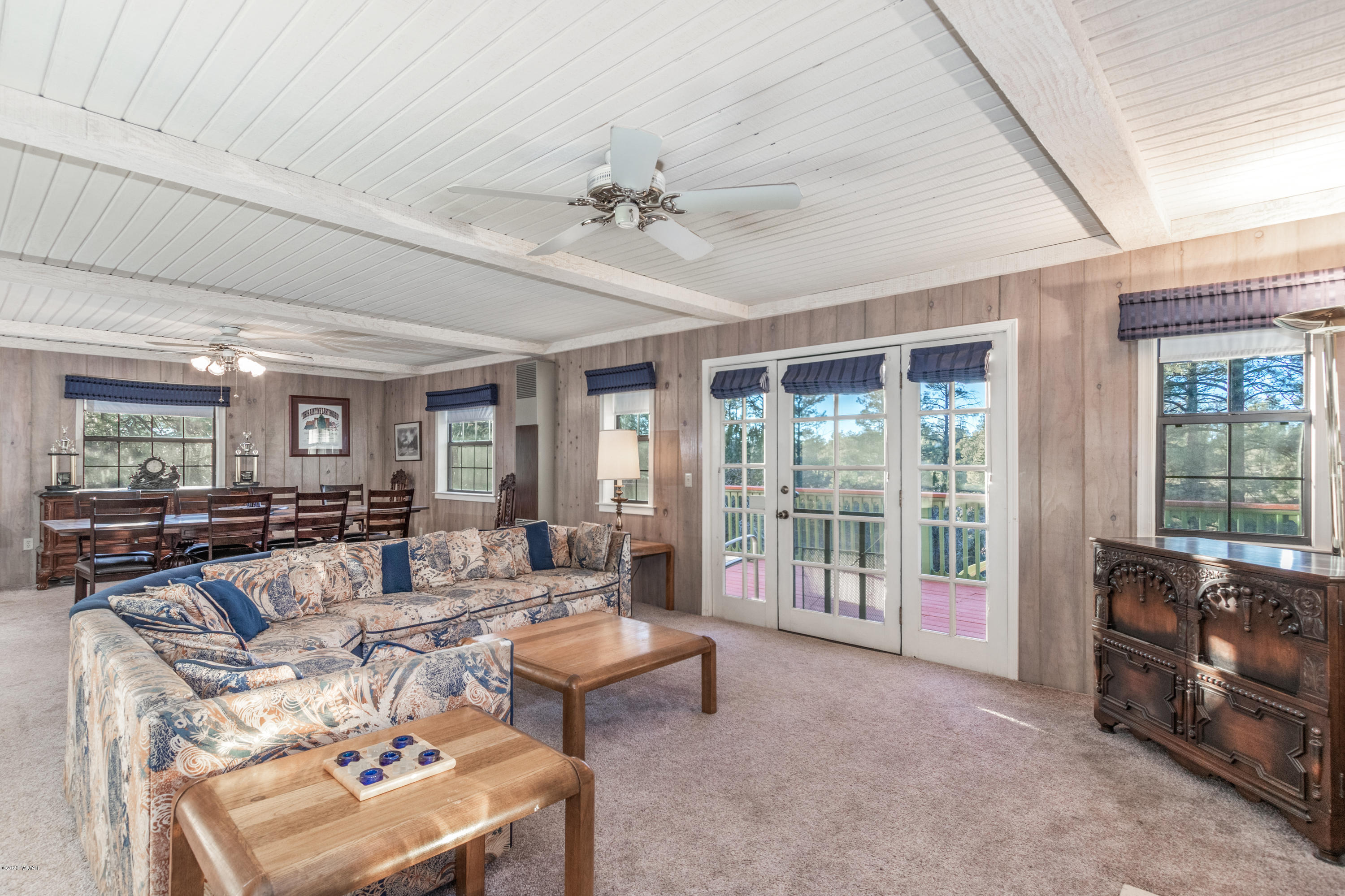 1939 Artist Draw Road Heber, AZ 85928 - Photo 15 of 40 a living room with furniture and a floor to ceiling window