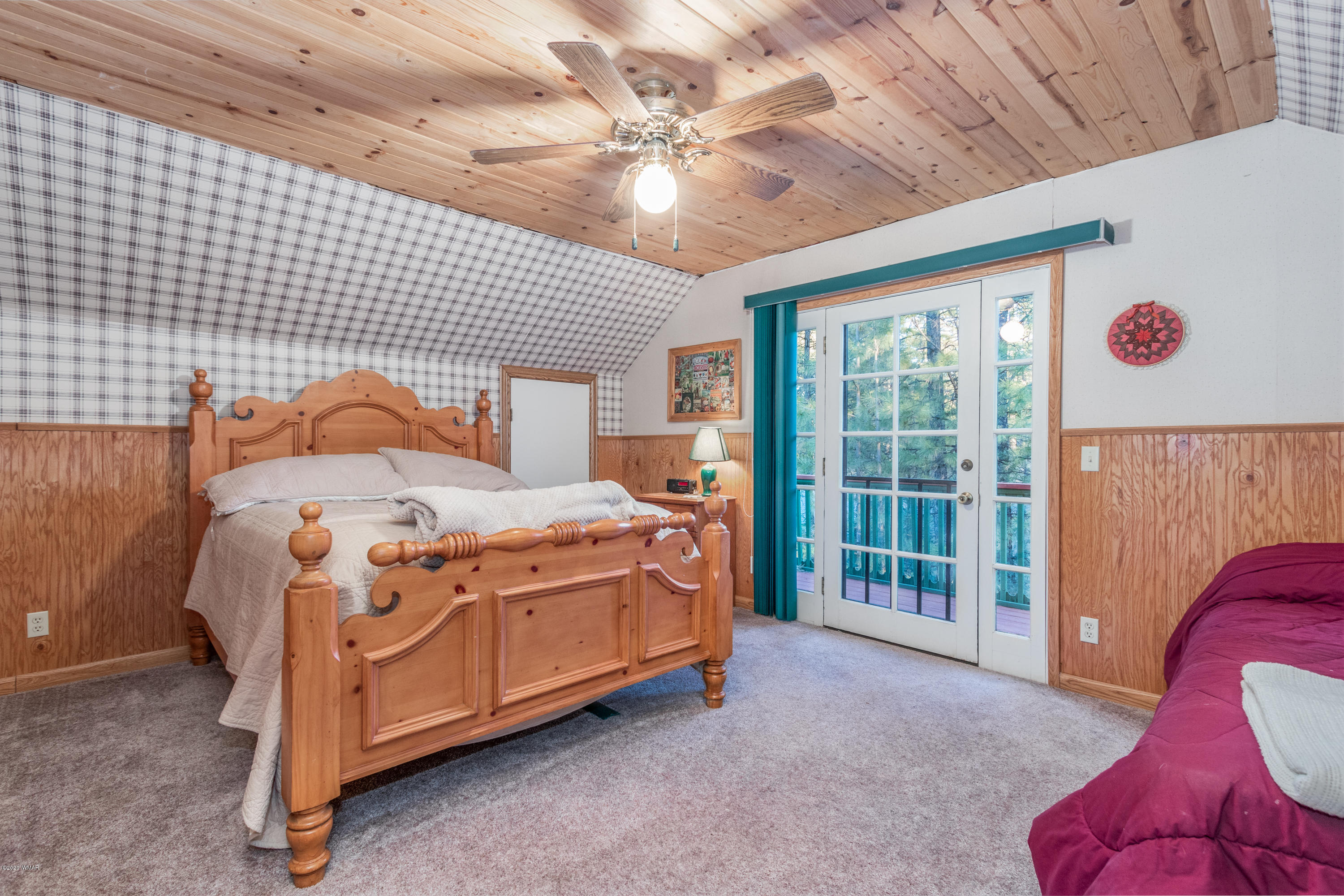 1939 Artist Draw Road Heber, AZ 85928 - Photo 17 of 40 a bedroom with a bed and a large window