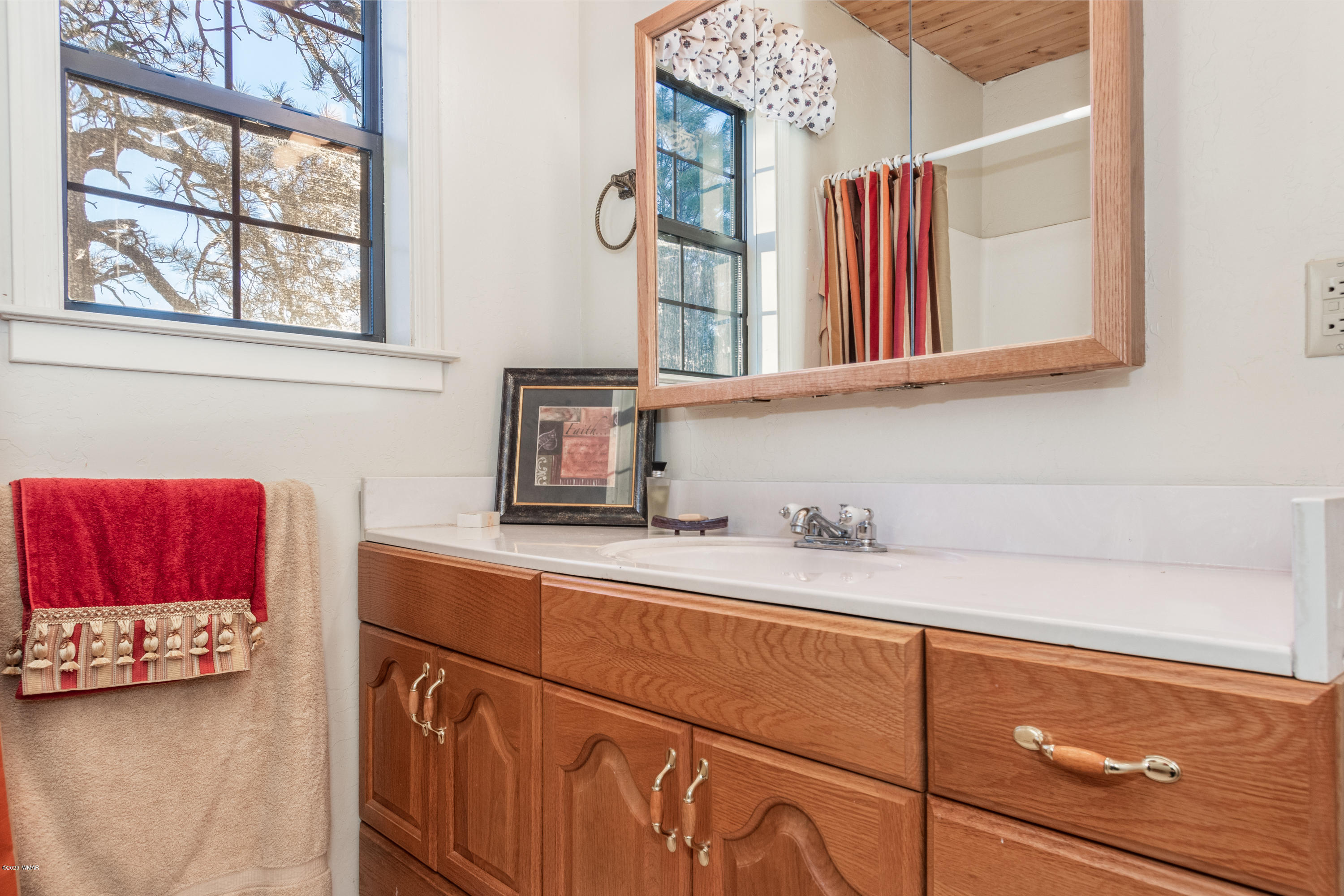 1939 Artist Draw Road Heber, AZ 85928 - Photo 22 of 40 a bathroom with a sink and a mirror