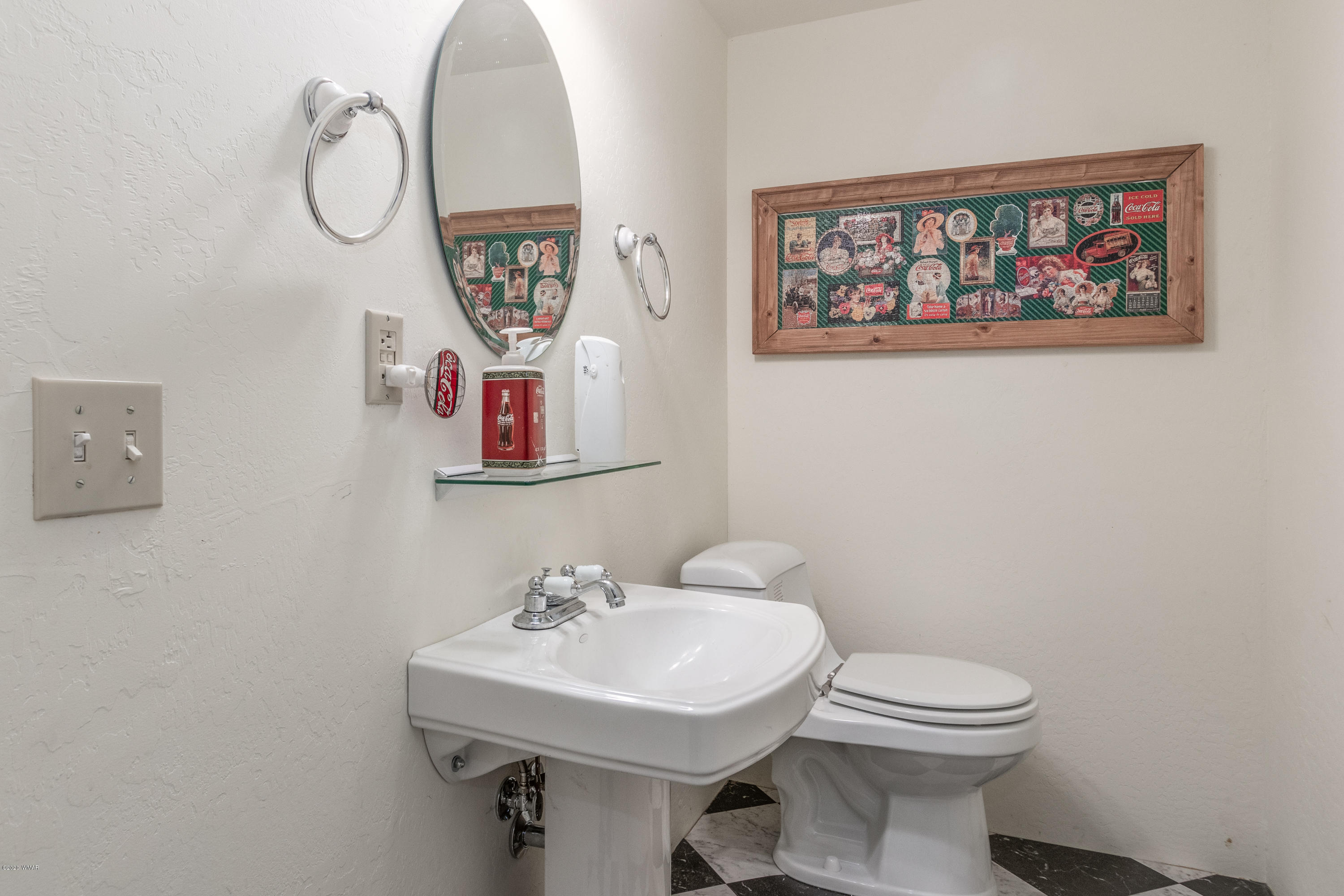 1939 Artist Draw Road Heber, AZ 85928 - Photo 26 of 40 a bathroom with a toilet a sink and mirror
