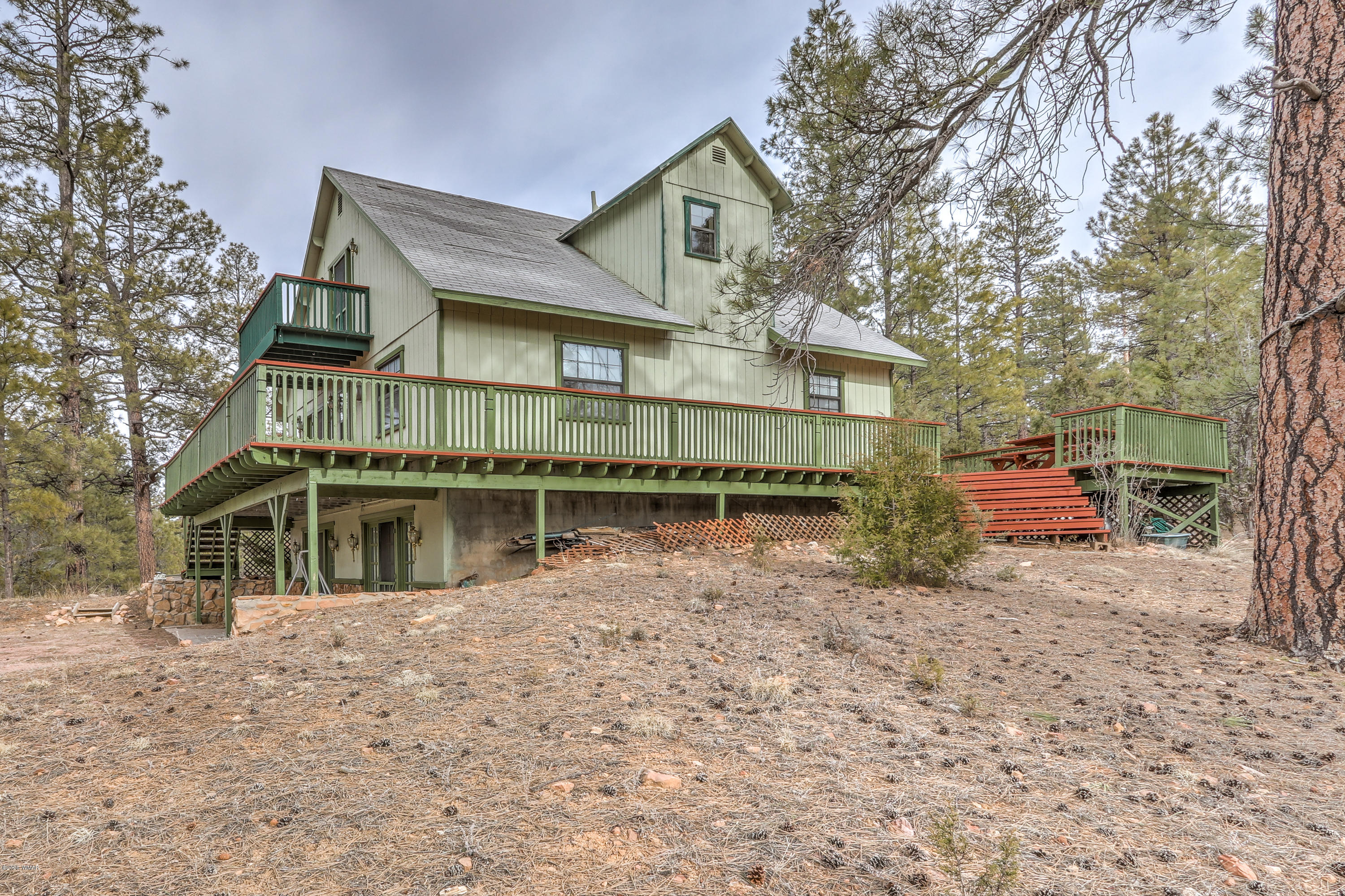 1939 Artist Draw Road Heber, AZ 85928 - Photo 5 of 40 a front view of a house with a yard