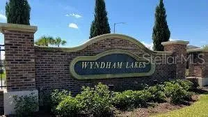 a view of a sign of a sign in front of a building