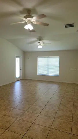 a view of an empty room and window
