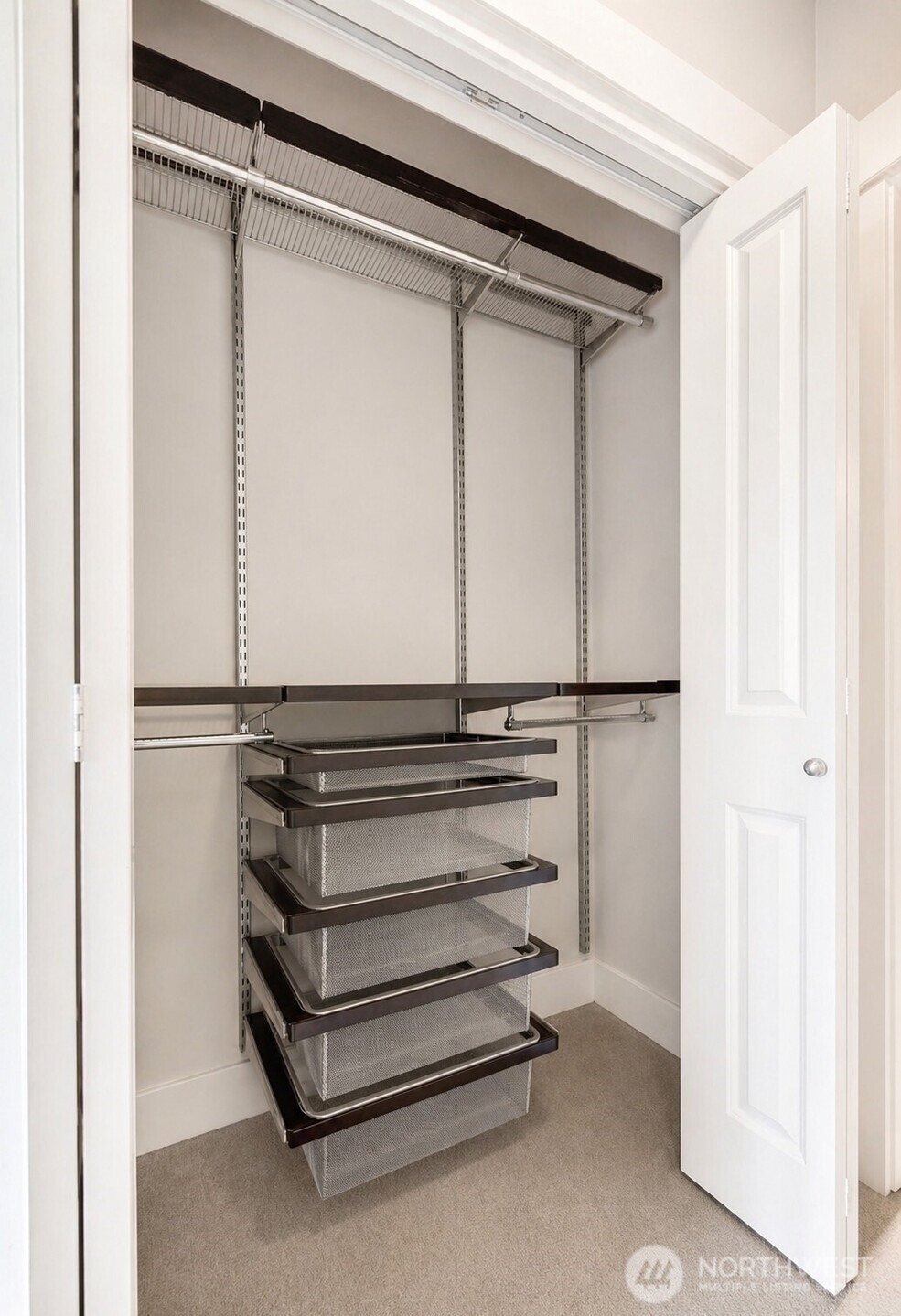 699 John Street, Unit 515 Seattle, WA 98109 - Photo 16 of 26 a refrigerator in a kitchen