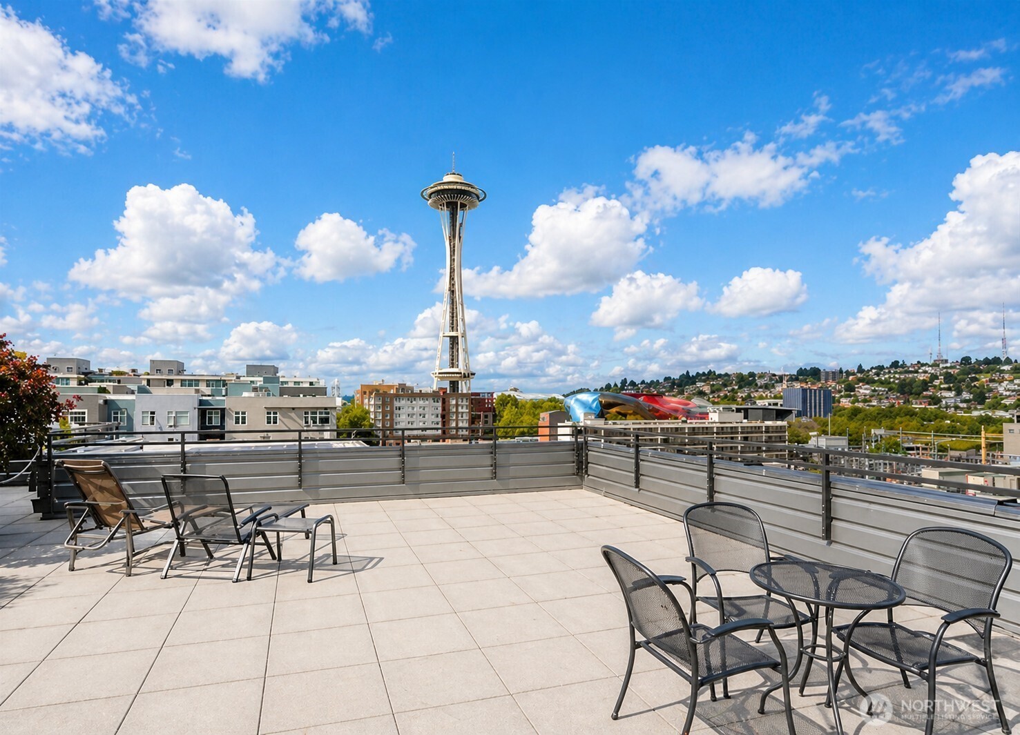 699 John Street, Unit 515 Seattle, WA 98109 - Photo 22 of 26 a view of a terrace with furniture