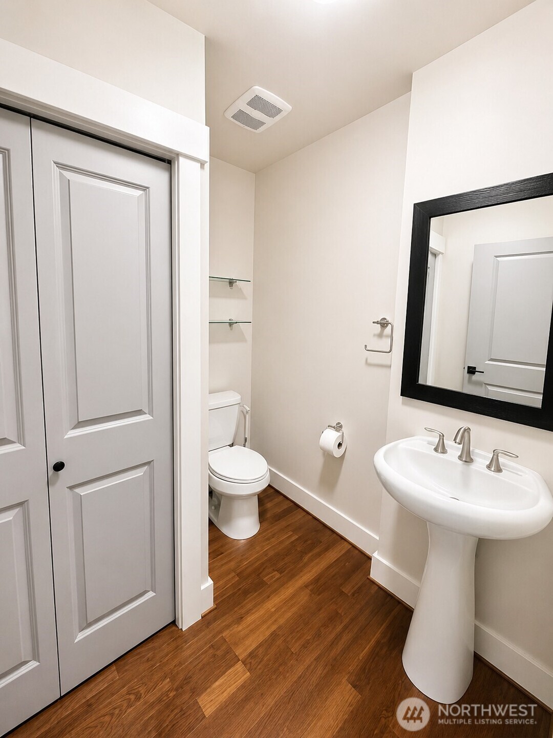 699 John Street, Unit 515 Seattle, WA 98109 - Photo 3 of 26 a bathroom with a sink toilet and mirror
