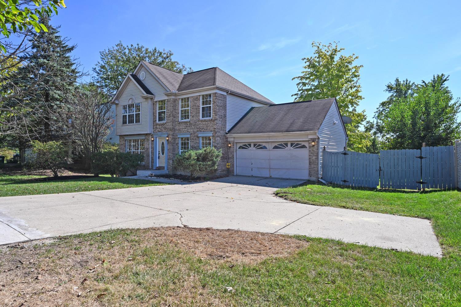 7853 West Chester Road West Chester, OH 45069 - Photo 2 of 54 Easy parking in the driveway with turnaround. Access to gated, fenced in backyard.