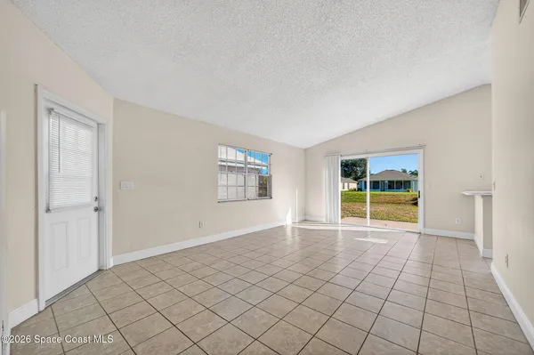 a view of a kitchen with a sink