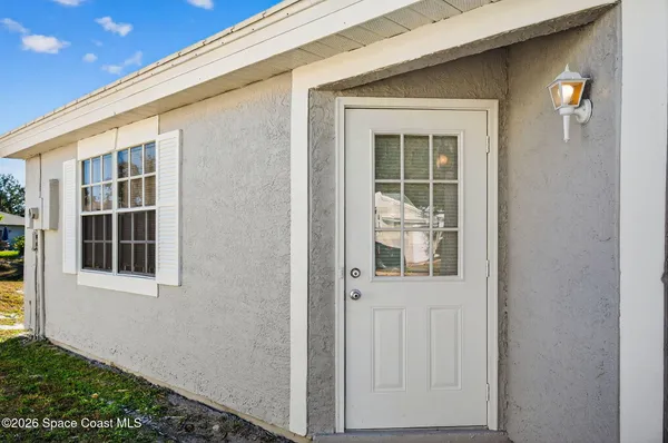 a view of a golf course with a lake