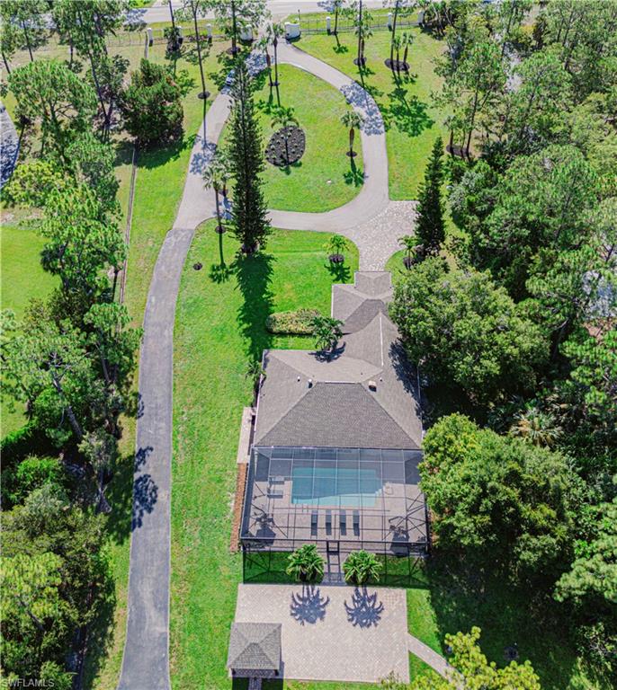 131 25th Street Southwest Naples, FL 34117 - Photo 4 of 50 an aerial view of a house