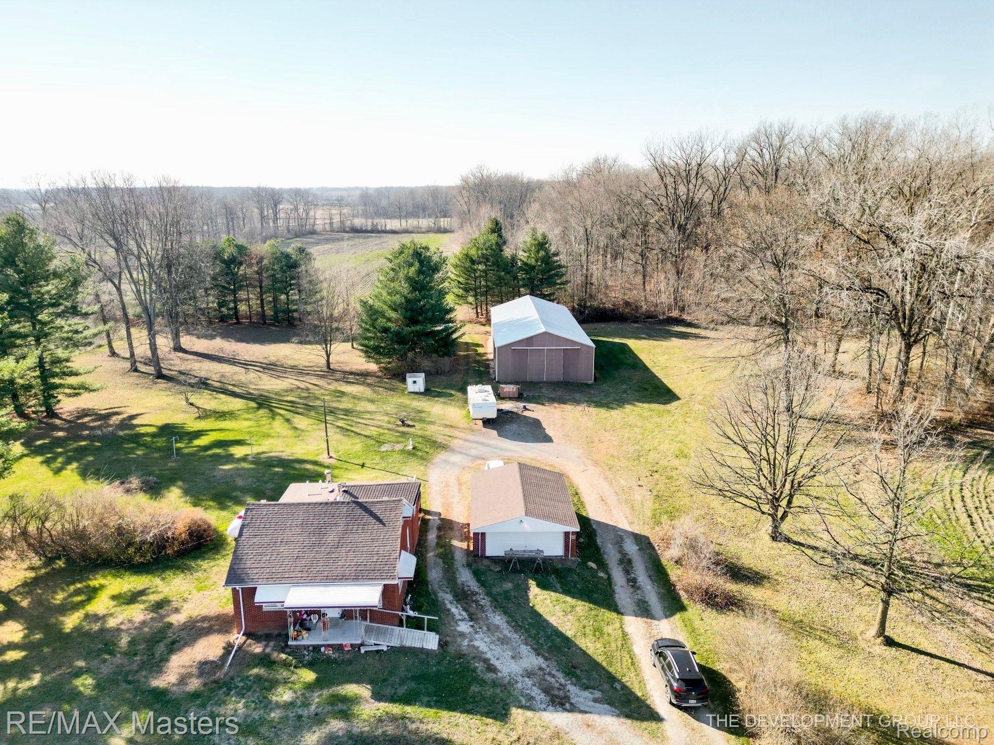 12527 Sumpter Road Carleton, MI 48117 - Photo 1 of 33 Quaint brick home sits on 38.5 acres!