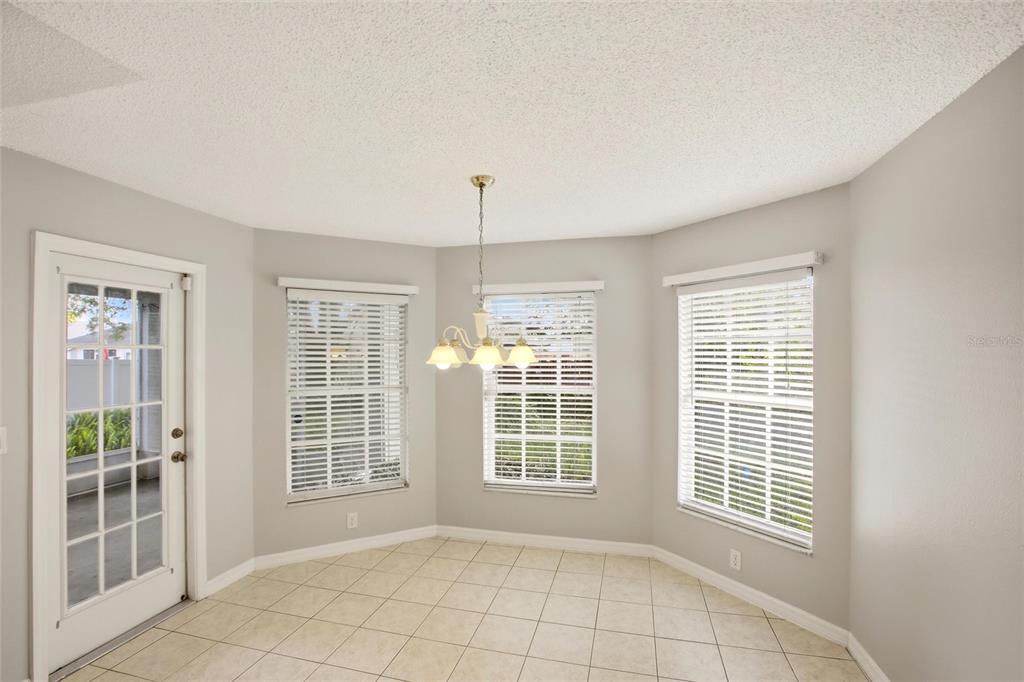 24644 Laurel Ridge Drive Lutz, FL 33559 - Photo 16 of 42 a view of an empty room with a window