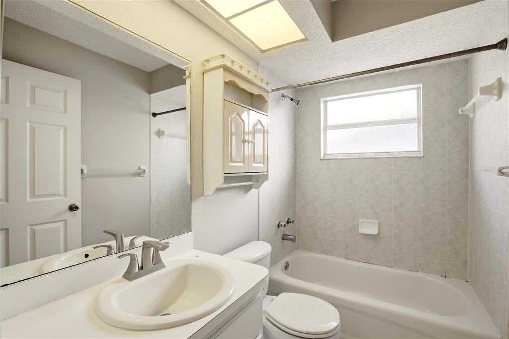 24644 Laurel Ridge Drive Lutz, FL 33559 - Photo 28 of 42 a bathroom with a sink toilet and shower