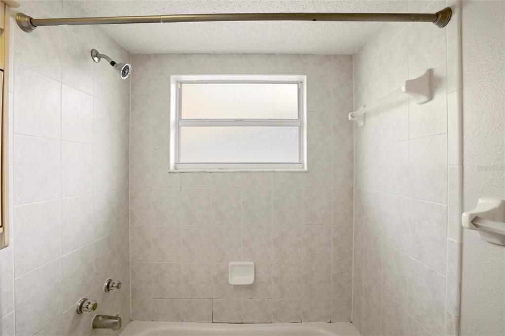 24644 Laurel Ridge Drive Lutz, FL 33559 - Photo 29 of 42 a bathroom with a window