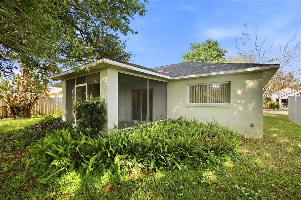 24644 Laurel Ridge Drive Lutz, FL 33559 - Photo 35 of 42 a front view of a house with a yard