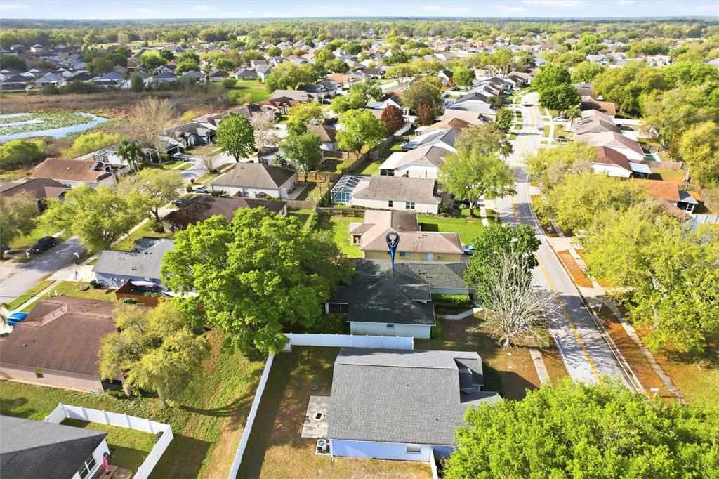 24644 Laurel Ridge Drive Lutz, FL 33559 - Photo 40 of 42 an aerial view of residential houses with outdoor space