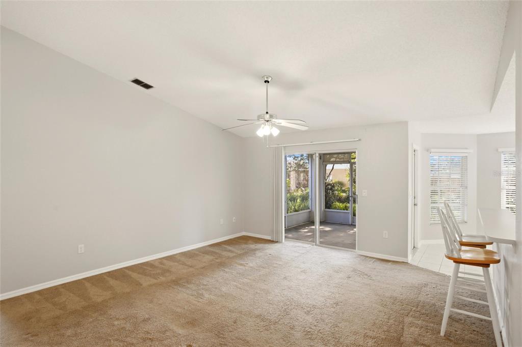 24644 Laurel Ridge Drive Lutz, FL 33559 - Photo 6 of 42 an empty room with windows