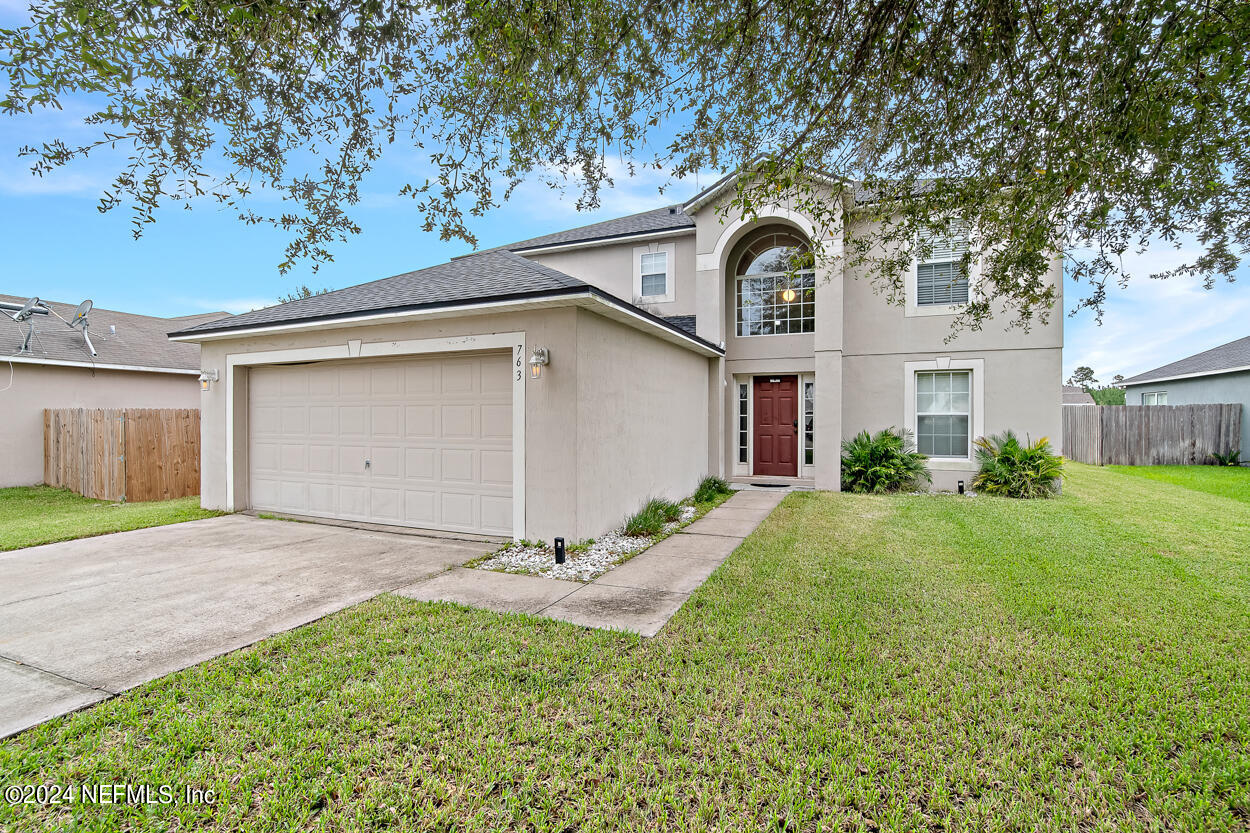 763 Largo Lane Macclenny, FL 32063 - Photo 1 of 1 a house view with a garden space