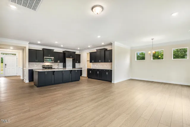 a view of a balcony with wooden floor