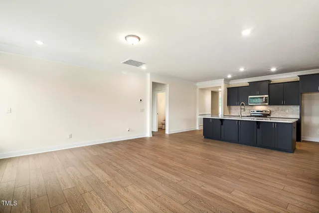 a view of a balcony with wooden floor