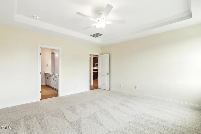 a spacious bathroom with a double vanity sink mirror and double