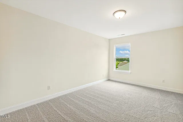 a bathroom with a sink toilet and a mirror