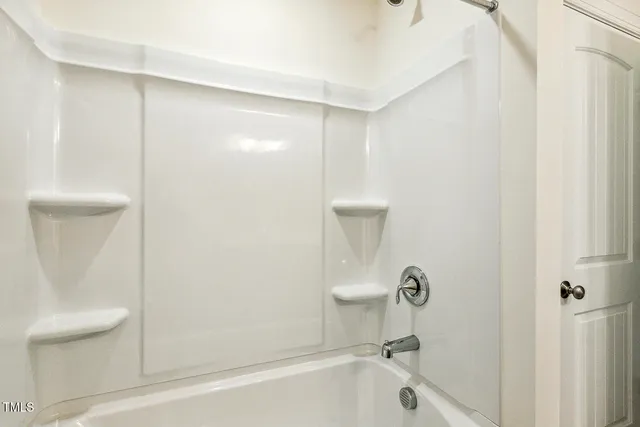 an empty room with an entryway