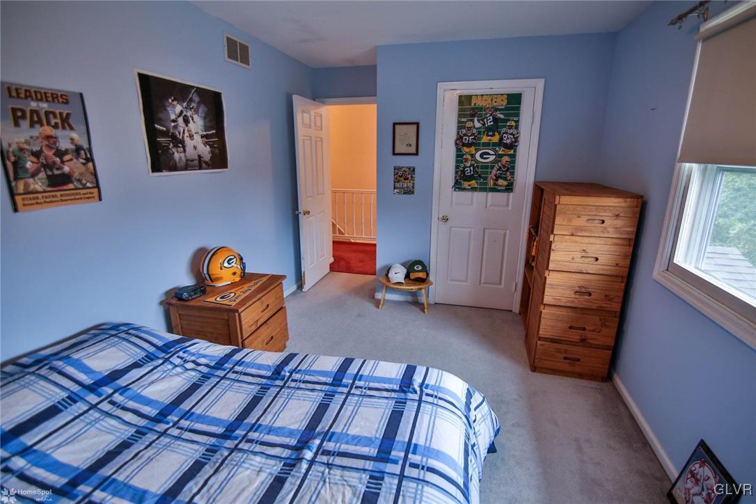 3056 Glendon Road Bethlehem, PA 18017 - Photo 16 of 22 a bedroom with bed and a window