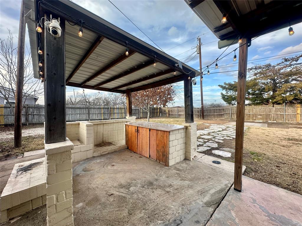 2734 Mildred Street Waco, TX 76706 - Photo 29 of 32 Fenced backyard featuring a patio