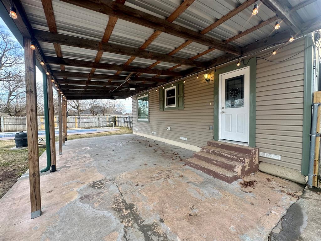 2734 Mildred Street Waco, TX 76706 - Photo 30 of 32 View of patio with entry steps and an attached carport