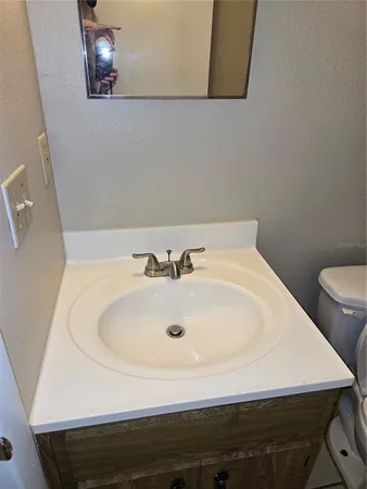 a bathroom with a sink and a toilet