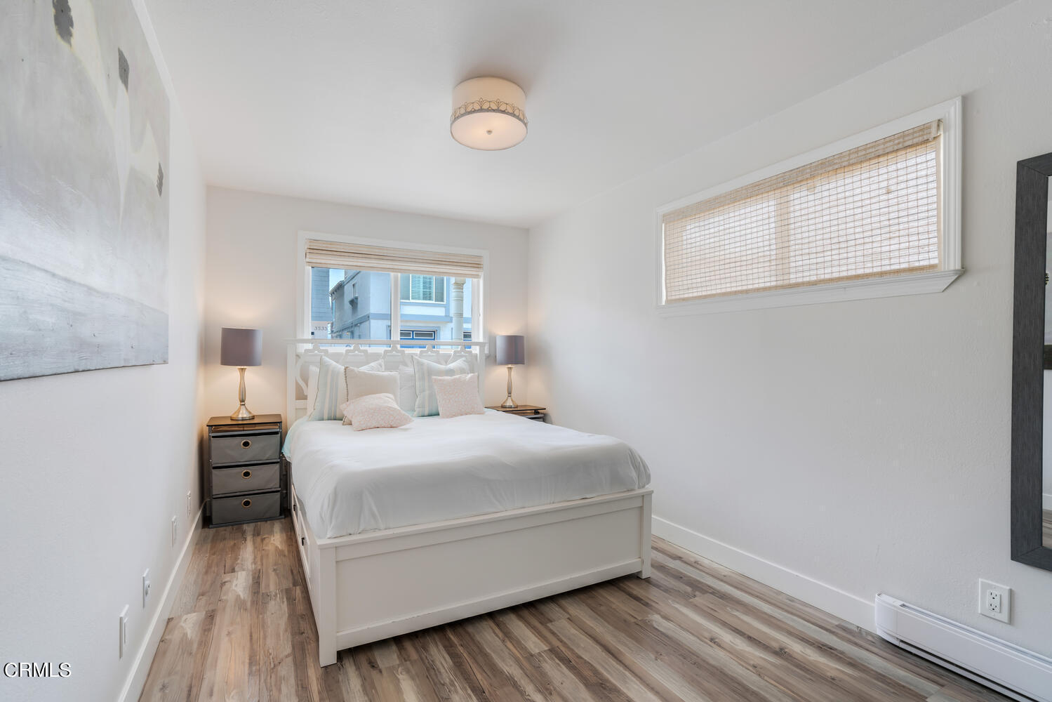 3534 Ocean Drive Oxnard, CA 93035 - Photo 22 of 47 a bedroom with a bed and a window