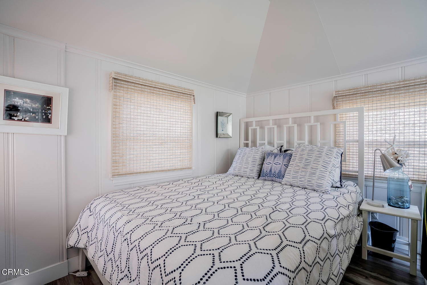 3534 Ocean Drive Oxnard, CA 93035 - Photo 25 of 47 a bedroom with a large bed and a window