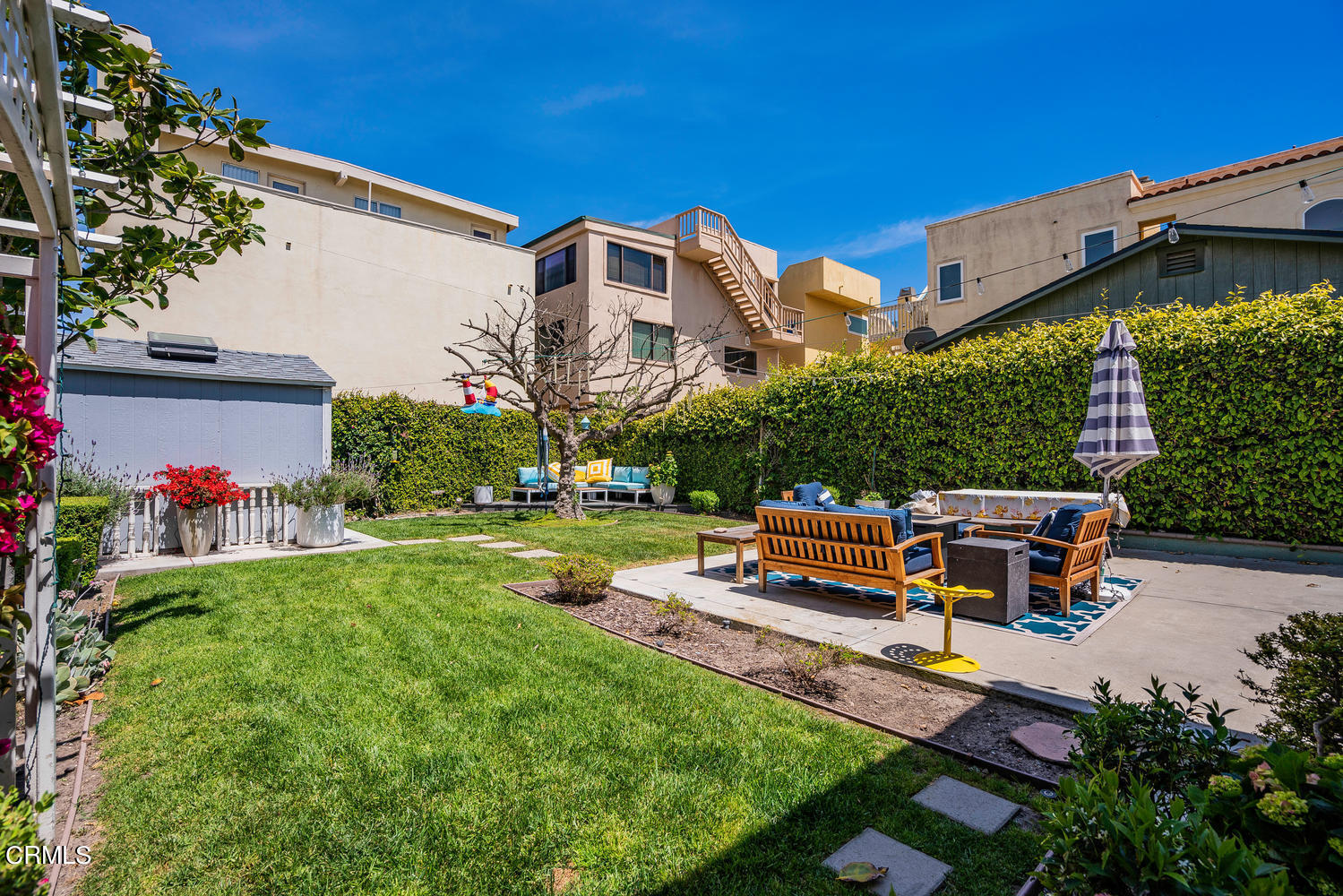 3534 Ocean Drive Oxnard, CA 93035 - Photo 31 of 47 a house view with a sitting space and garden