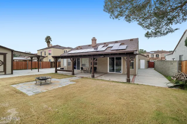 a front view of a house with swimming pool