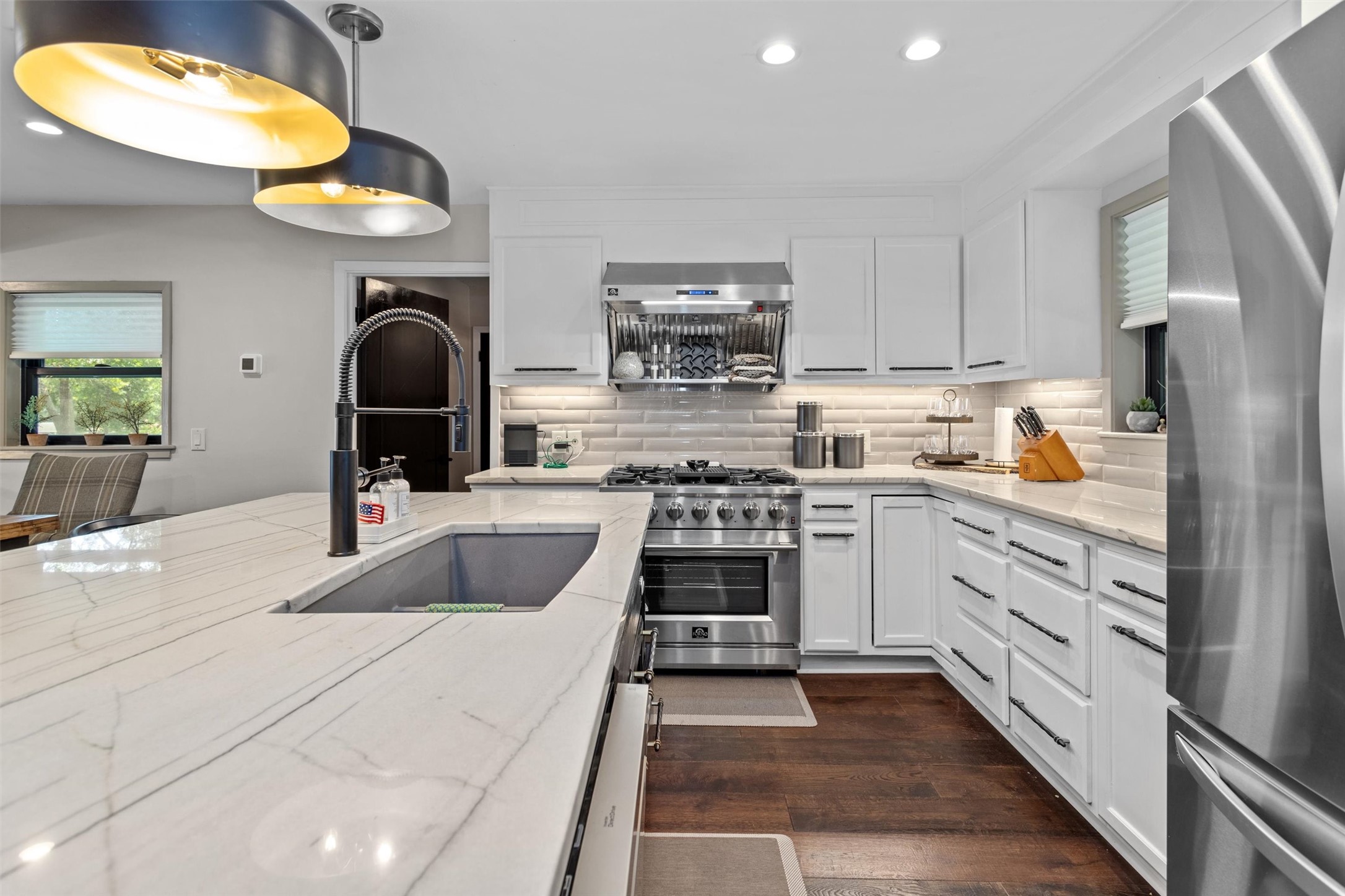 678 Sawmill Road Crockett, TX 75835 - Photo 18 of 29 a kitchen with stainless steel appliances granite countertop a sink a stove and a refrigerator