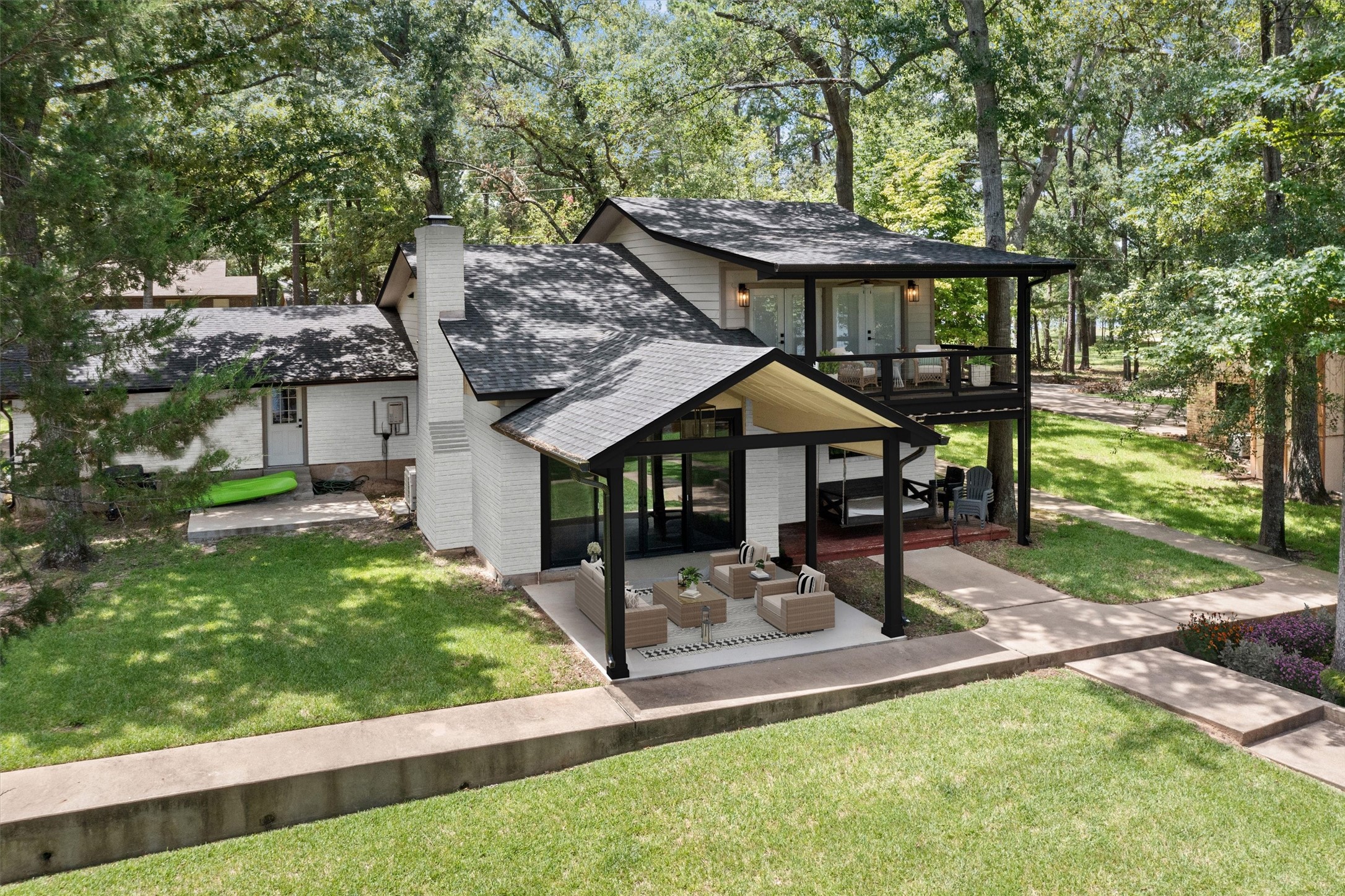 678 Sawmill Road Crockett, TX 75835 - Photo 3 of 29 a front view of a house with garden