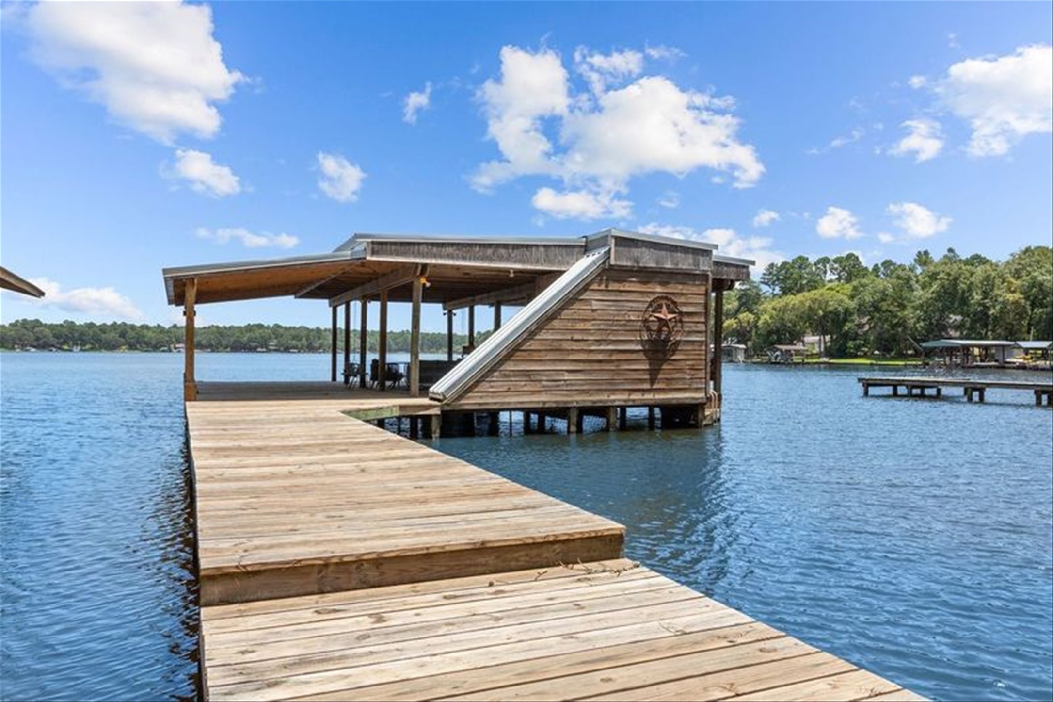 678 Sawmill Road Crockett, TX 75835 - Photo 7 of 29 a view of a swimming pool with seating space