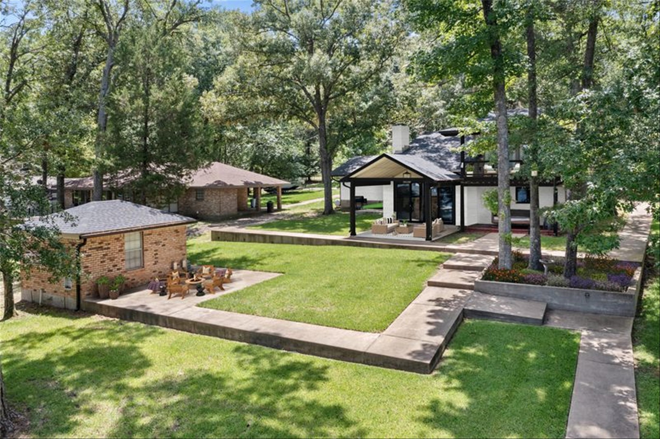 678 Sawmill Road Crockett, TX 75835 - Photo 8 of 29 a front view of a house with garden