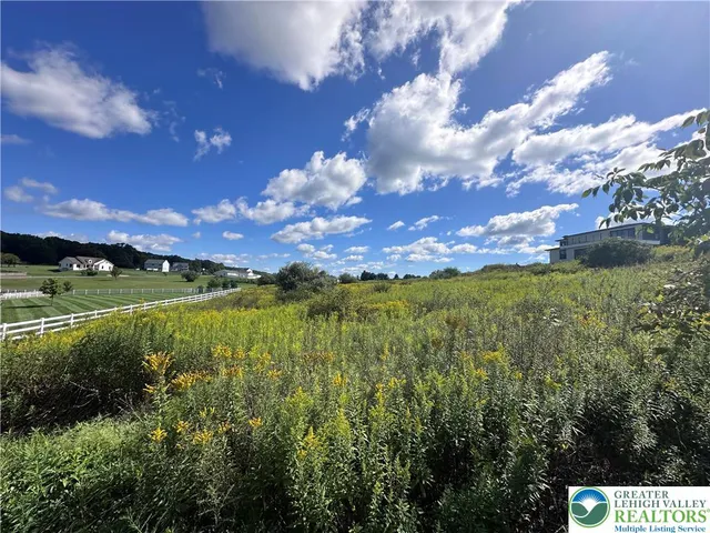 a view of lake with sunset