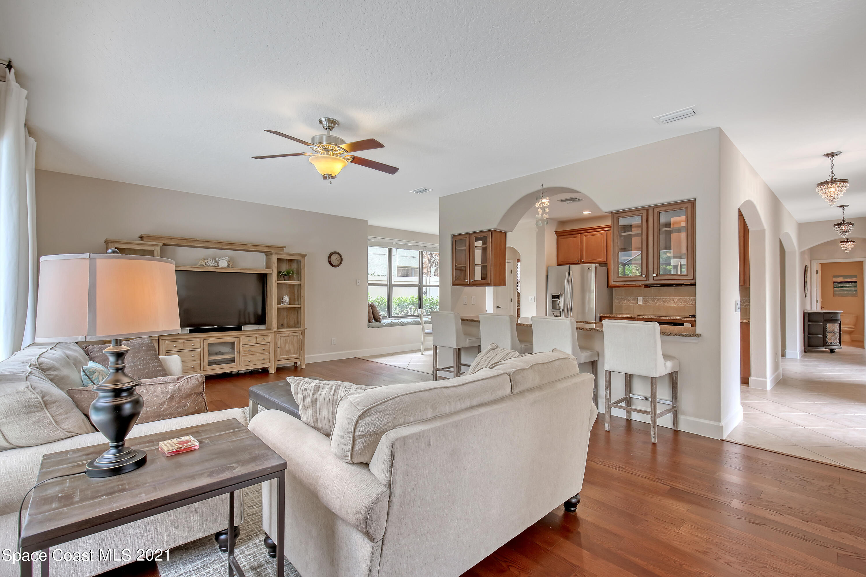 1380 Talon Way Melbourne, FL 32934 - Photo 14 of 59 a living room with furniture and a flat screen tv