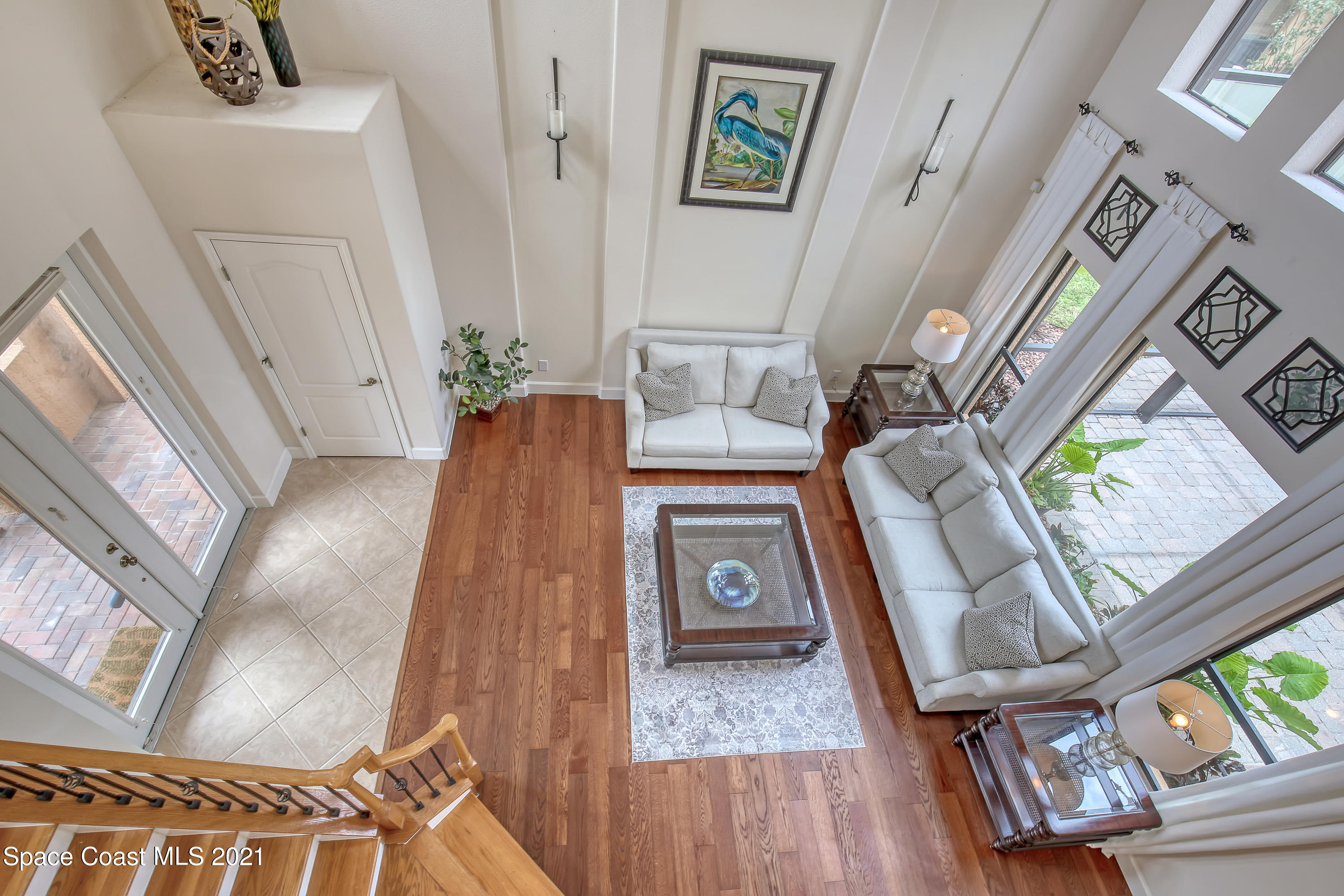 1380 Talon Way Melbourne, FL 32934 - Photo 23 of 59 a living room with furniture and a fireplace