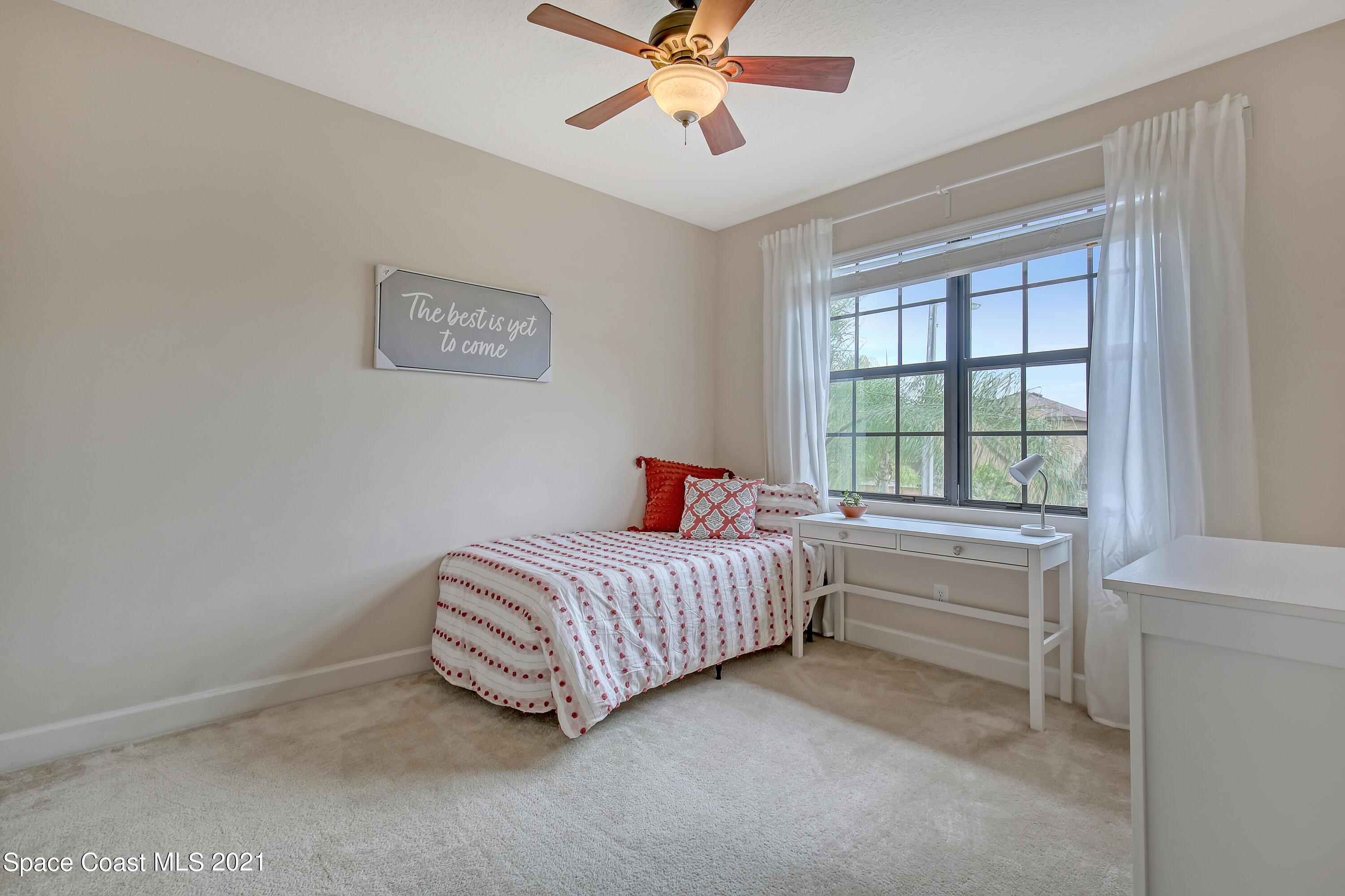 1380 Talon Way Melbourne, FL 32934 - Photo 25 of 59 a room with a bed and a window