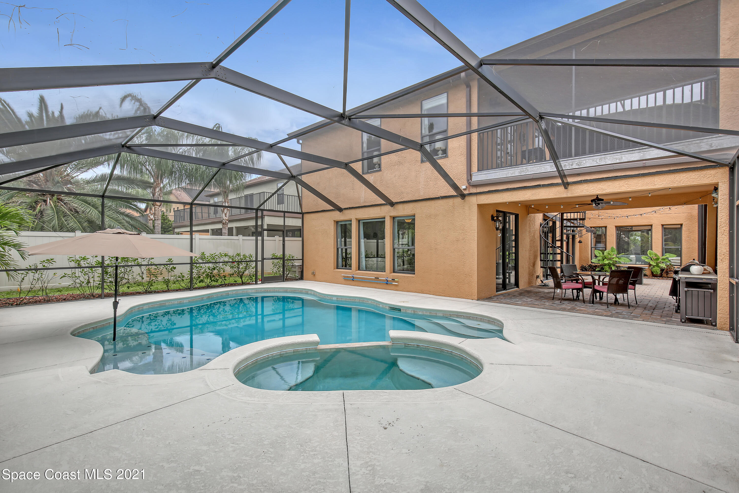 1380 Talon Way Melbourne, FL 32934 - Photo 49 of 59 a view of a house with backyard and sitting area
