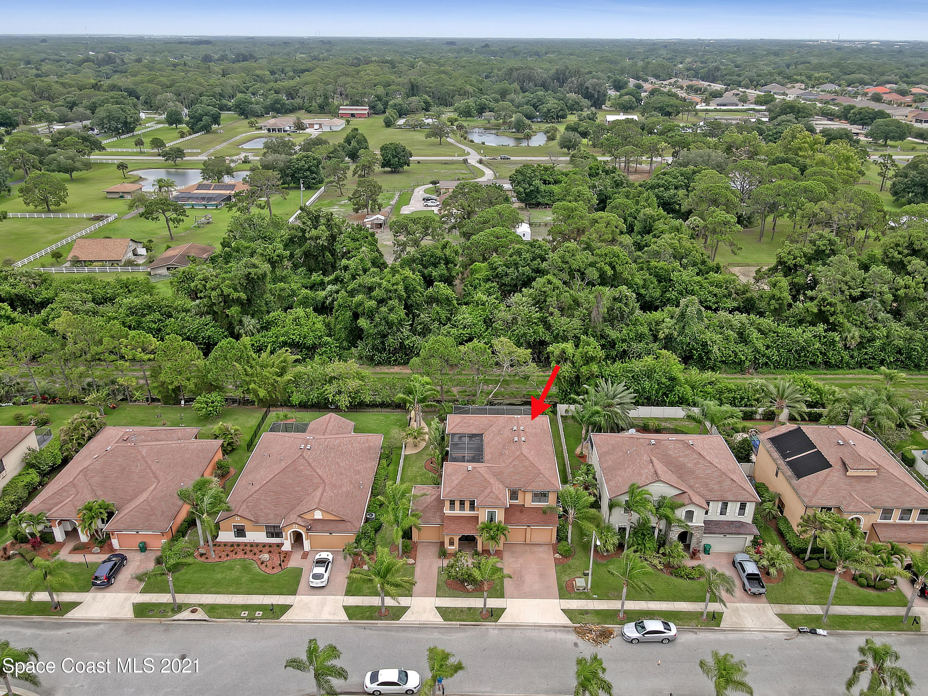 1380 Talon Way Melbourne, FL 32934 - Photo 54 of 59 an aerial view of residential houses with outdoor space and street view