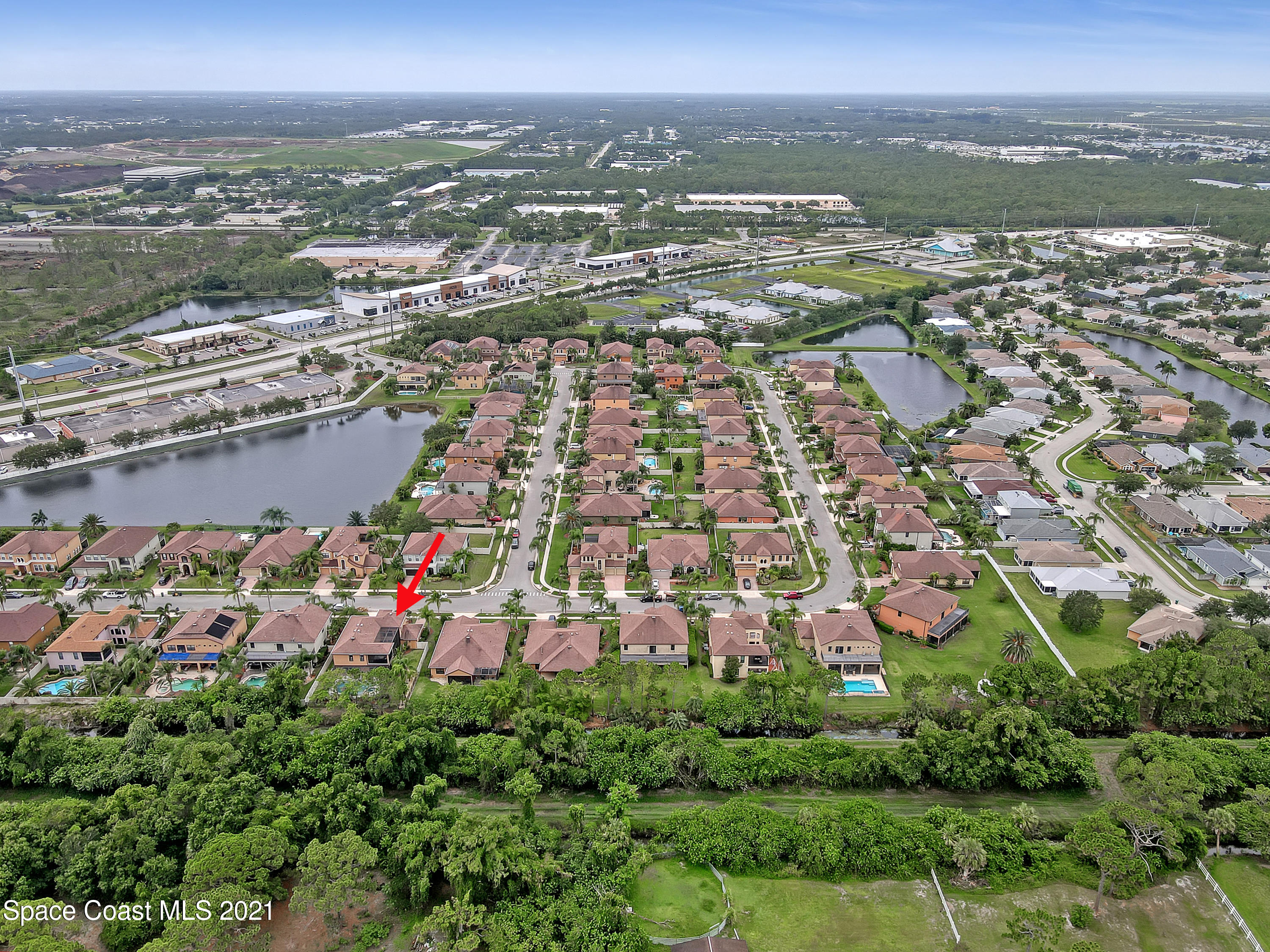 1380 Talon Way Melbourne, FL 32934 - Photo 56 of 59 an aerial view of city and lake