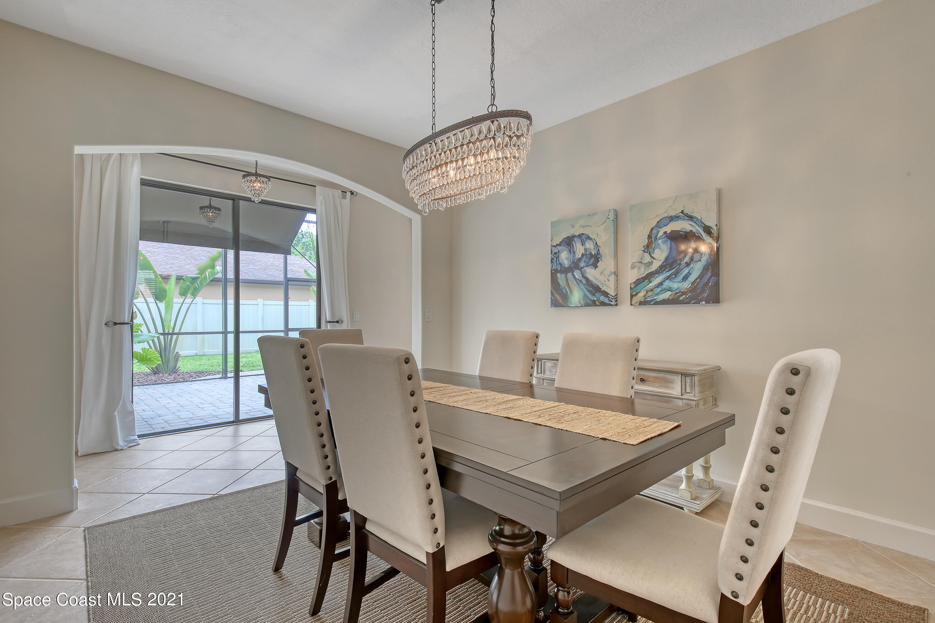 1380 Talon Way Melbourne, FL 32934 - Photo 10 of 59 a view of a dining room with furniture window and outside view
