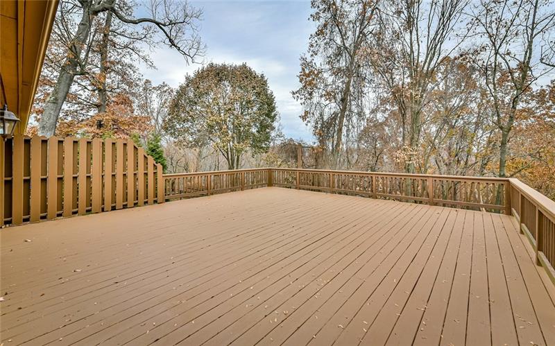10120 Deer View Point Road Wexford, PA 15090 - Photo 17 of 24 Just look at this 24x24 deck overlooking a private rear yard and view. Nothing but view behind this home. The deck has just been refinished and includes privacy fencing on both sides.
