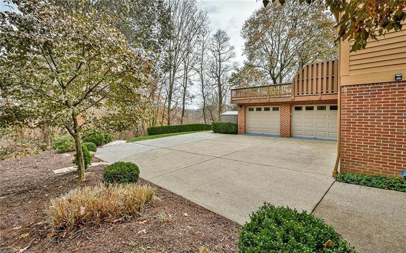 10120 Deer View Point Road Wexford, PA 15090 - Photo 21 of 24 Additional view of the extended drive, the two car attached garage with above deck and the rear view of complete privacy.