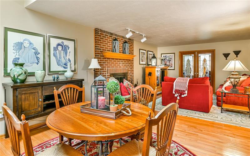 10120 Deer View Point Road Wexford, PA 15090 - Photo 7 of 24 This large and bright family room provides access through custom glass doors to the den at the front of the home.